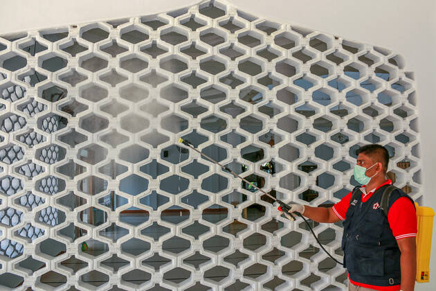 April 23, 2020, Aceh Utara, Aceh, Indonesia: A volunteer from the Indonesian Red Cross (PMI) disinfects the Baiturrahman Mosque as a preventive measure against the spread of coronavirus ahead of the holy month of Ramadan in North Aceh Regency. Aceh Utara Indonesia - ZUMAs197 20200423_zaa_s197_133 Copyright: xMaskurxHasx
