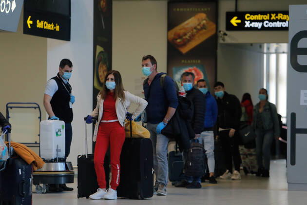 (200423) -- BUCHAREST, April 23, 2020 (Xinhua) -- Seasonal workers from Romania to United Kingdom for agricultural harvest wait for their departure flight amid COVID-19 pandemic at the Henri Coanda International Airport near Bucharest, Romania, on April 23, 2020. Romania has reported 386 new COVID-19 cases in the past 24 hours, bringing the total number of confirmed cases to 10,096, local authorities said on Thursday. (Photo by Cristian Cristel Xinhua) ROMANIA-BUCHAREST-COVID-19-SEASONAL WORKERS 