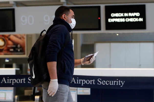 (200423) -- BUCHAREST, April 23, 2020 (Xinhua) -- A seasonal worker from Romania to the United Kingdom for agricultural harvest prepares to check in for his departure flight amid COVID-19 pandemic at the Henri Coanda International Airport near Bucharest, Romania, on April 23, 2020. Romania has reported 386 new COVID-19 cases in the past 24 hours, bringing the total number of confirmed cases to 10,096, local authorities said on Thursday. (Photo by Cristian Cristel Xinhua) ROMANIA-BUCHAREST-COVID-19-SEASONAL WORKERS 