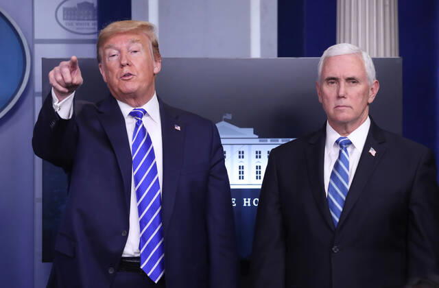 United States President Donald J. Trump (L) and US Vice President Mike Pence (R) is joined by members of the Coronavirus Task Force to deliver remarks on the COVID-19 pandemic in the James S. Brady Press Briefing Room of the White House in Washington, DC, USA, 23 April 2020. Copyright: xMichaelxReynoldsx xPoolxviaxCNPx MediaPunchx