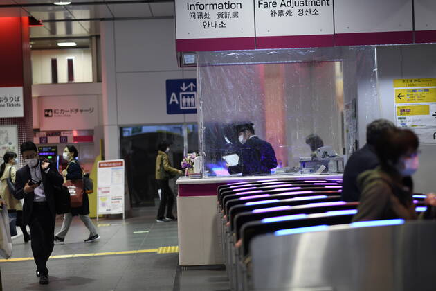 TOKYO, JAPAN - APRIL 23: A plastic sheet curtain is placed between a JR staff is seen at Shinjuku Station amid the coronavirus pandemic on Thursday, April 23, 2020 in Tokyo, Japan. Japanese Prime Minister Shinzo Abe declared a nationwide State of Emergency last week requesting businesses including schools, athletic facilities, bars and restaurants to temporarily close or operate under reduced hours and urging people to stay home to stop spreading of the coronavirus throughout the country. (Photo: Richard Atrero de Guzman AFLO) (125658875)