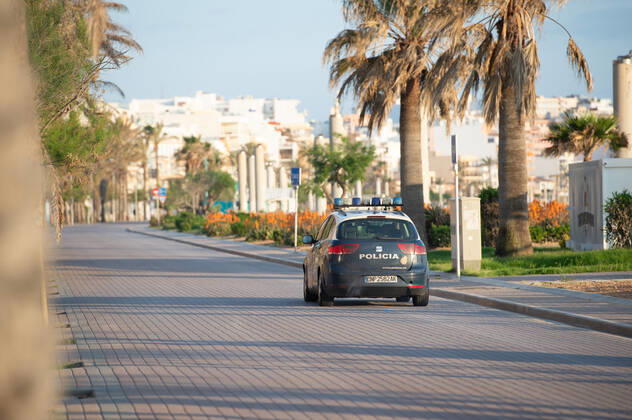 20200423 Corona Lock down in Mallorca PALMA DE MALLORCA, SPAIN - APRIL 23 2020 : Car of the Policia National ant the Playa de Palma at - Corona Lock down in Mallorca on April 23, 2020 in Palma de Mallorca, . Palma de Mallorca Baleares Spain