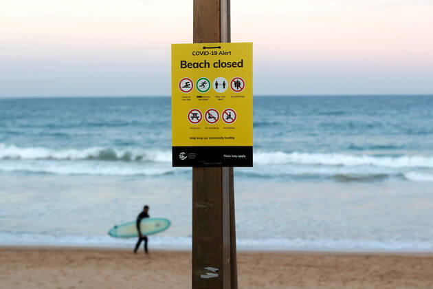 SYDNEY, AUSTRALIA - APRIL 23: Surfer on a closed Dee Why beach due to COVID 19 on 23 April, 2020 in Sydney, Australia. (Photo by Speed Media Icon Sportswire)