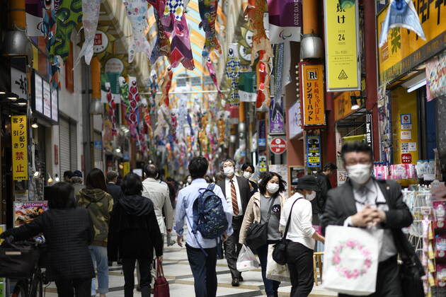 TOKYO, JAPAN - APRIL 24: People wearing face masks is seen at Nakano shopping district amid the coronavirus outbreak on Friday, April 24, 2020 in Tokyo, Japan. Japanese Prime Minister Shinzo Abe declared a nationwide State of Emergency last week to stop the spreading of the coronavirus throughout the country. (Photo: Richard Atrero de Guzman AFLO)  (125672623)
