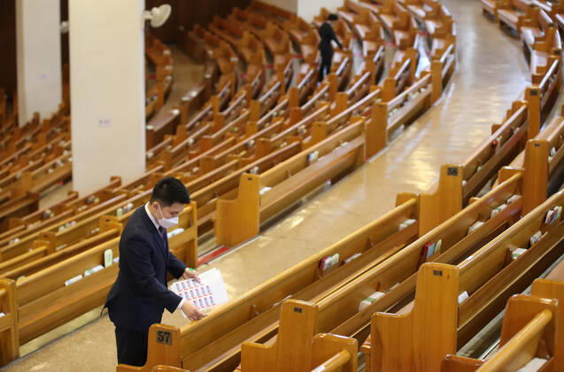 April 24, 2020, ¼Â­Â¿Ã¯ÃÜÂ¯ÂºÂ°Â½Ã: For devotees safety Officials place stickers to assign seats for believers amid social distancing at a major church in Seoul on April 24, 2020, ahead of services. Churches nationwide are expected to resume Masses this weekend as the government mitigated social distancing rules owing to the sharp drop in new COVID-19 infections. Â¼Â­Â¿Ã¯ÃÜÂ¯ÂºÂ°Â½o - ZUMAnc39 20200424_zaa_nc39_029 Copyright: xYonhapxNewsx