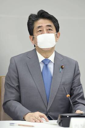 New coronavirus Japanese Prime Minister Shinzo Abe attends a meeting of a coronavirus task force at his office in Tokyo on April 24, 2020. 