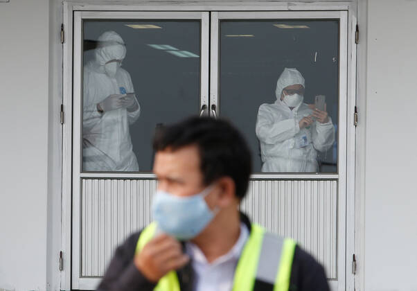 April 24, 2020, Bangkok, Thailand: Officials wearing protective suits are seen at Don Mueang International Airport in Bangkok during the Coronavirus (COVID-19) crisis..Thailand has so far reported 2,854 cases of COVID-19 coronavirus with most of the cases reported in the Capital city of Bangkok. Bangkok Thailand - ZUMAs197 20200424_zaa_s197_054 Copyright: xChaiwatxSubprasomx
