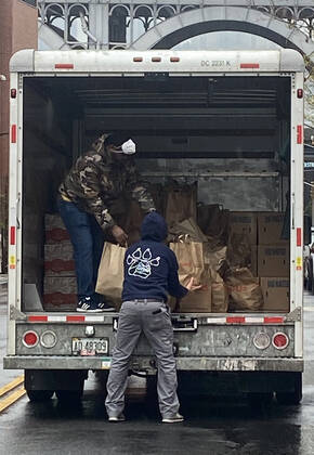 NEW YORK, NY- APRIL 24: Workers unload bags of food for New Yorkers at food distribution point with paper bags donated by Staples at Roberto Clemente School during the coronavirus pandemic in West Harlem on April 24, 2020 in New York City. Copyright: xRainmakerxPhotos MediaPunchx
