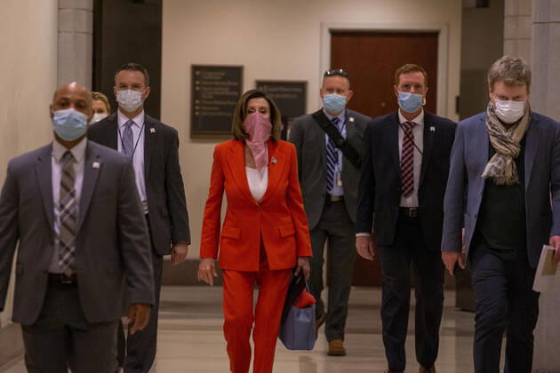 Speaker of the House Nancy Pelosi, D-Calif., arrives for her weekly press conference at U.S Capital in Washington, D.C. on Friday, April 24 2020, Congress delivered a nearly $500 billion infusion of coronavirus spending Thursday, rushing new relief to employers and hospitals buckling under the strain of a pandemic that has claimed almost 50,000 American lives and one in six U.S. jobs.  WAP20200424001 TASOSxKATOPODIS