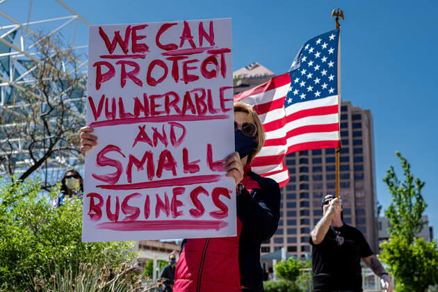 April 24, 2020, Albuquerque, New Mexico, USA: April 24, 2020 Heather Winklejohn joins dozens of other protesters near Civic Plaza in downtown Albuquerque to demand government officials re-open businesses deemed nonessential. Albuquerque USA - ZUMAab1_ 20200424_zaf_ab1_001 Copyright: xAnthonyxJacksonx