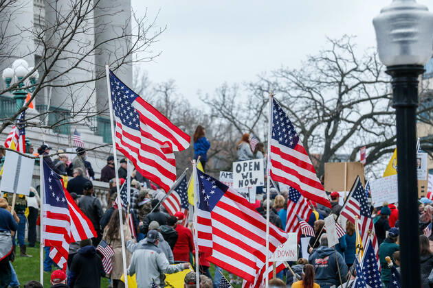 MADISON, WI - APRIL 24: At a Rally to Reopen Wisconsin , Safer at Home protesters demonstrate against measures enacted to mitigate the Coronavirus congregate close together to hear speeches on April 24, 2020 at the Wisconsin state Capitol in Madison, WI. (Photo by Lawrence Iles Icon Sportswire)