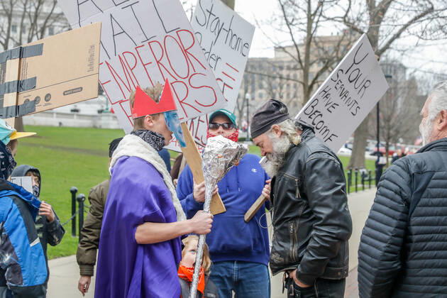 April 24, 2020, Madison, WI, USA: MADISON, WI - APRIL 24: At a Rally to Reopen Wisconsin , Safer at Home protesters opposed to measures enacted to mitigate the Coronavirus purposely stand close together on April 24, 2020 at the Wisconsin state Capitol in Madison, WI. ( Icon Sportswire) Madison USA - ZUMAi88_ 20200424_zaf_i88_007 Copyright: xLawrencexIlesx