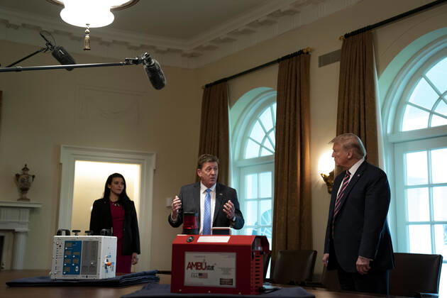 April 24, 2020, Washington, District of Columbia, USA: United States President Donald J. Trump, right, listens to Dave Gallagher, Associate Director, NASA Jet Propulsion Laboratory during a presentation on NASA s COVID-19 response in the Cabinet Room of the White House in Washington DC on April 24th, 2020 Washington USA - ZUMAs152 20200424_zaa_s152_058 Copyright: xAnnaxMoneymakerx