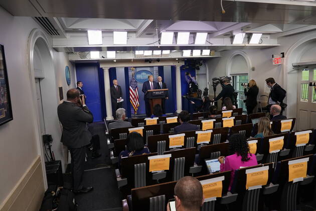 April 24, 2020, Washington, District of Columbia, USA: United States President Donald Trump participates in a news briefing with members of the Coronavirus Task Force at the White House in Washington, DC on April 24, 2020. Standing with the President are Stephen Hahn, Commissioner, US Food and Drug Administration (FDA), left, and US Vice President Mike Pence, right Washington USA - ZUMAs152 20200424_zaa_s152_096 Copyright: xChrisxKleponisx