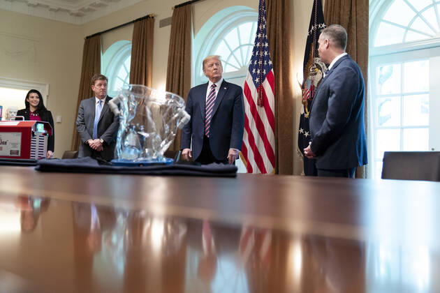 April 24, 2020, Washington, The District of Columbia, United States Of America: President Donald J. Trump, joined by Dave Gallagher, Associate Director of the NASA Jet Propulsion Laboratory, listens as NASA Administrator Jim Bridenstine delivers remarks during a meeting to discuss NASAs response to the coronavirus pandemic Friday, April 24, 2020, in the Cabinet Room of the White House..People: President Donald Trump. Washington United States Of America - ZUMAs214 20200424_zaa_s214_006 Copyright: xSMGx