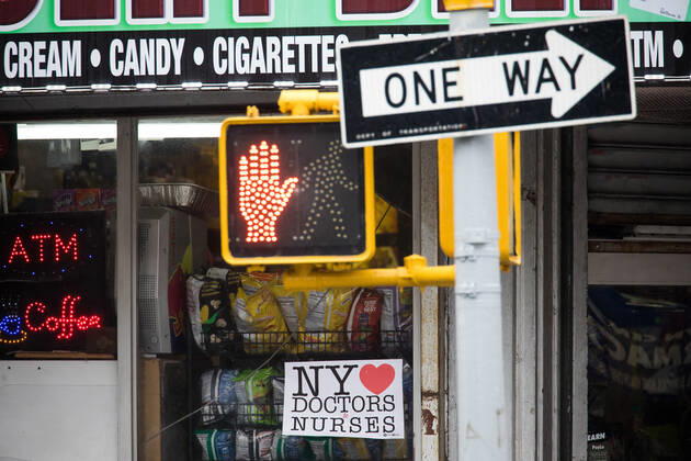 (200424) -- NEW YORK, April 24, 2020 (Xinhua) -- A sign expressing love for doctors and nurses is displayed in the window of a convenience store outside the Brooklyn Hospital Center in the Brooklyn borough of New York, the United States, on April 24, 2020. More than 50,000 people have died of COVID-19 in the United States while debates are heightening over reopening the country s economy severely battered by the virus. A total of 870,468 cases have been reported in the United States with the death toll reaching 50,031 as of 11 a.m. Friday (1500 GMT), according to the Center for Systems Science and Engineering (CSSE) at Johns Hopkins University. (Photo by Michael Nagle Xinhua) U.S.-NEW YORK-COVID-19-DEATH TOLL 