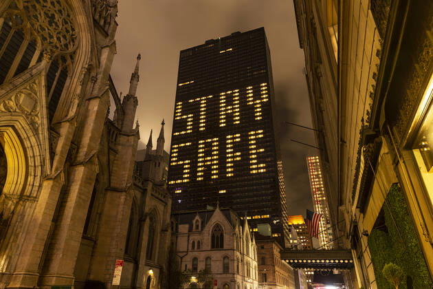 Daily life in New York amid COVID-19 pandemic Stay Home words made by lit windows seen on Loote New York Palace hotel in Midtown Manhattan during COVID-19 pandemic New York New York United States Copyright: LevxRadin