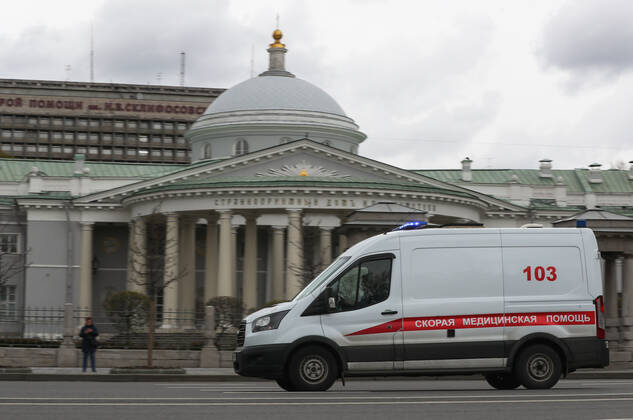 MOSCOW, RUSSIA - APRIL 25, 2020: An ambulance is seen near buildings of Sklifosovsky Research Institute for Emergency Medicine (hospital) in central Moscow during the pandemic of the novel coronavirus disease (COVID-19). Since 30 March, Moscow has been on lockdown. Earlier, the Russian government announced a paid period off work for employed people, which has been extended till the end of April. As of 25 April 2020, Russia has reported more than 68,700 confirmed cases of the novel coronavirus infection, with more than 36,800 confirmed cases in Moscow. Vladimir Gerdo TASS  TS0D7072