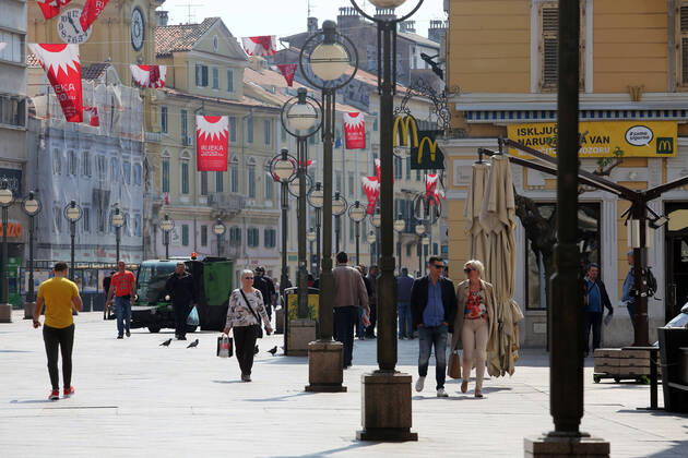 As traders prepare window displays to open, citizens stroll through Korzo 25.04.2020., Croatia, Rijeka - Numerous citizens walked through Korzo. Shops are setting up shop windows ahead of opening next week. GoranxKovacic PIXSELL