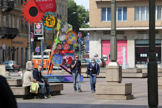 As traders prepare window displays to open, citizens stroll through Korzo 25.04.2020., Croatia, Rijeka - Numerous citizens walked through Korzo. Shops are setting up shop windows ahead of opening next week. GoranxKovacic PIXSELL