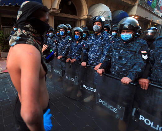 April 23, 2020, Beirut, Beirut, Lebanon: Lebanese protesters Anti-government, some wearing masks to help curb the spread of the coronavirus, take part in a protest against the Lebanese central bank s governor Riad Salameh and against the deepening financial crisis, at Hamra trade street, in Beirut, Lebanon, April 24, 2020. Lebanon s currency continued its downward spiral against the dollar on Thursday, reaching a new low amid financial turmoil in the crisis-hit country compounded by the coronavirus outbreak Beirut Lebanon - ZUMAap3_ 20200423_zaf_ap3_179 Copyright: xHaithamxAl-Mousawix