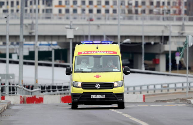 MOSCOW, RUSSIA â€“ APRIL 25, 2020: An ambulance near the Novomoskovsky multipurpose medical centre for patients with suspected COVID-19 coronavirus infection, in Kommunarka, Novomoskovsky Administrative District of Moscow. As of 25 April 2020, Russia has reported more than 68,700 confirmed cases of the novel coronavirus, with more than 36,800 confirmed cases in Moscow. Gavriil Grigorov TASS  TS0D70BC
