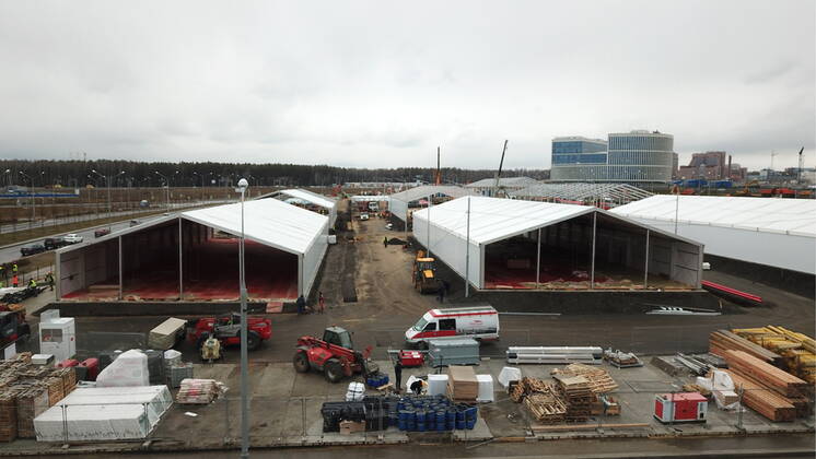 MOSCOW, RUSSIA â€“ APRIL 25, 2020: An aerial view of the construction site for prefabricated medical facilities for recovering COVID-19 patients at the Novomoskovsky multipurpose medical centre for patients with suspected COVID-19 coronavirus infection, in Kommunarka, Novomoskovsky Administrative District of Moscow. As of 25 April 2020, Russia has reported more than 68,700 confirmed cases of the novel coronavirus, with more than 36,800 confirmed cases in Moscow. Mikhail Japaridze TASS  TS0D70A4