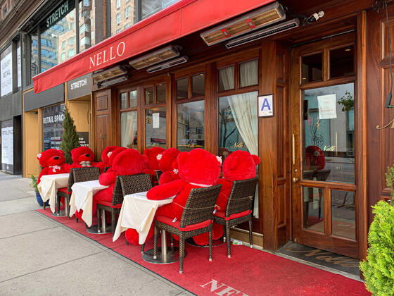 April 25, 2020, New York, USA: (NEW) Covid-19:Teddy bears substitute customers in a restaurant.April 25,2020,New York,USA:Because of the absence of customers who normally eats at their restaurant on Madison Avenue,Nello restaurant has decided to sit red teddy bears on their seats substituting humans.The restaurant only operates take out and delivery services during this Coronavirus pandemic.The stay at home,no agglomeration of people and business closure order in the city continue except for essential ones...Credit: Thenews2 New York - ZUMAn293 20200425_znp_n293_005 Copyright: xNiyixFotex