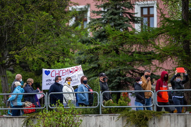 Residents of the areas along the Czech-Polish border met in the adjacent towns of Cesky Tesin and Cieszyn, situated each on the other side of the border, to protest against the border closure over covid-19 that has divided many families and barred many from commuting to work, on April 25, 2020, in Cesky Tesin, Czech Republic. (CTKxPhoto VladimirxPrycek) CTKPhotoP202004250201601 PRY 0005