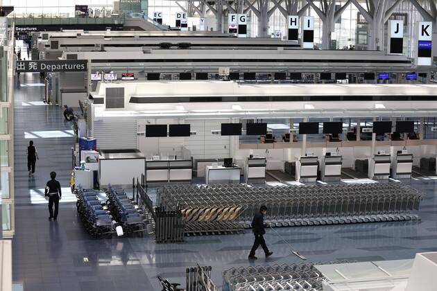 New coronavirus Fewer people than usual are seen at the international departure lobby at Tokyo s Haneda airport on April 25, 2020, the first day of Japan s Golden Week holidays, under a state of emergency over the coronavirus pandemic. 