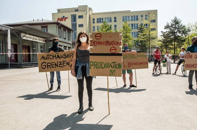 April 25, 2020, Munich, Bavaria, Germany: Contrasting with numerous, controversial Querfront demonstrations in the city center, pro-democracy and left-wing groups demonstrated at the Munich-Giesing train station under the national motto of Ã¢â‚¬oeKeine Quarantaene fuer FreiheitsrechteÃ¢â‚¬Â (No Quarantine for Freedom and Rights). The wave of demonstrations on all fronts are part of a relaxing of the restrictions and in response to a court case that judged the right for demonstrations to be maintained. The group displayed a critical tone against corporations being given favorable treatment during the crisis instead of ordinary people and workers. The group also maintained an explicit pro-science message, with regard to the Coronavirus crisis. Munich Germany - ZUMAb160 20200425_zbp_b160_084 Copyright: xSachellexBabbarx