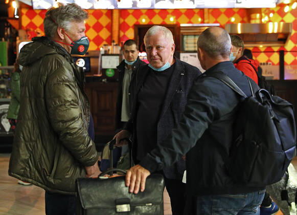KALININGRAD REGION, RUSSIA - APRIL 25, 2020: Russian sailors evacuated by an Ural Airlines charter flight from the Spanish port of Las Palmas arrive at Kaliningrad s Khrabrovo International Airport. On March 27, the Russian government ordered an international flight ban amid the ongoing COVID-19 pandemic, so around 400 Russian sailors, including those 200 from Kaliningrad, found themselves stranded at Gran Canaria Airport. Vitaly Nevar TASS  TS0D7145
