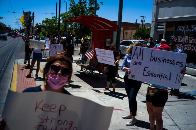 April 25, 2020, El Paso, Texas: People gather during a Reopen Texas rally in El Paso, Texas. Non-essential personal in El Paso and other cities in Texas continue to remain under stay-at-home orders due to the coronavirus outbreak. El Paso - ZUMAj106 20200425_zap_j106_001 Copyright: xJoelxAngelxJuarezx