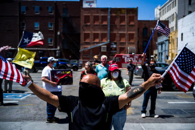 April 25, 2020, El Paso, Texas: XAVIER ARMENDARIZ, 64, of El Paso, gathers with protestors during a Reopen Texas rally in El Paso, Texas. Non-essential personal in El Paso and other cities in Texas continue to remain under stay-at-home orders due to the coronavirus outbreak. El Paso - ZUMAj106 20200425_zap_j106_003 Copyright: xJoelxAngelxJuarezx
