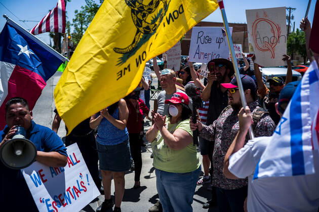 April 25, 2020, El Paso, Texas: People gather during a Reopen Texas rally in El Paso, Texas. Non-essential personal in El Paso and other cities in Texas continue to remain under stay-at-home orders due to the coronavirus outbreak. El Paso - ZUMAj106 20200425_zap_j106_005 Copyright: xJoelxAngelxJuarezx