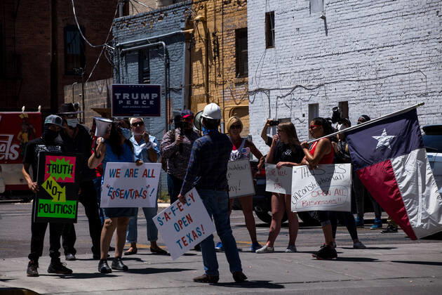 April 25, 2020, El Paso, Texas: People gather during a Reopen Texas rally in El Paso, Texas. Non-essential personal in El Paso and other cities in Texas continue to remain under stay-at-home orders due to the coronavirus outbreak. El Paso - ZUMAj106 20200425_zap_j106_007 Copyright: xJoelxAngelxJuarezx