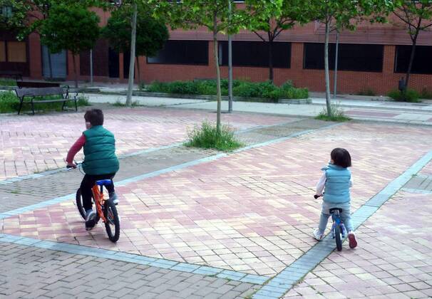 A family walks past the Madrid Street after restrictions were partially lifted for children for the first time in six weeks, during the coronavirus disease COVID 19 outbreak in Madrid, Spain, April 26, Cordon Press