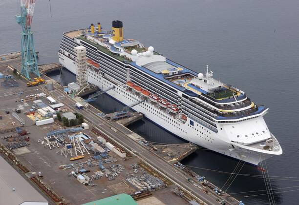 New coronavirus Photo taken from a Kyodo News helicopter on April 26, 2020, shows the Costa Atlantica cruise ship anchored in the southwestern Japan city of Nagasaki on April 26, 2020. Out of 623 crew members with no passengers on board, 148 have tested positive for the new coronavirus. 