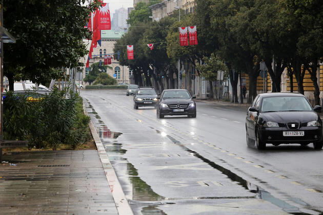 Rainy Sunday in Rijeka 26.04.2020., Croatia, Rijeka - Morning rain after a long time in Rijeka area and few citizens in the city center, except in places where coffee is sold outside and at the city market. GoranxKovacic PIXSELL