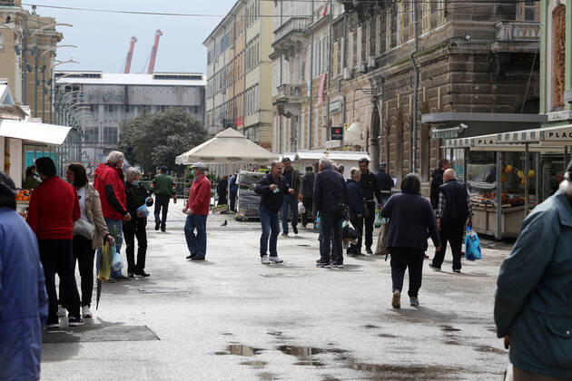 Rainy Sunday in Rijeka 26.04.2020., Croatia, Rijeka - Morning rain after a long time in Rijeka area and few citizens in the city center, except in places where coffee is sold outside and at the city market. GoranxKovacic PIXSELL