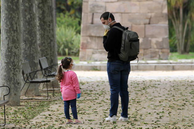 A family walks the streets of Madrid during the first day of permission so that the children can spend an hour daily on the street during the health crisis due to the Covid-19 virus pandemic - Coronaviruss. April 26,2020. (2020042683)