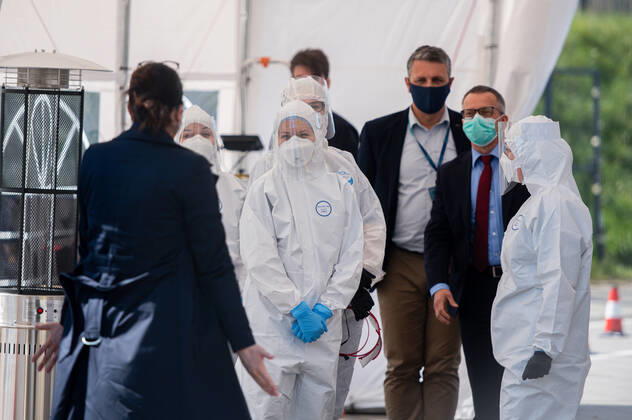 April 27, 2020, Gdansk, Poland: Medics are seen at the drive thru tent during their work. .The covid-19 drive thru testing center was opened in Gdansk on April 27. Tests are taken after prior registration. Patients without getting out of the car may be tested for coronavirus. Gdansk Poland - ZUMAs227 20200427_zip_s227_001 Copyright: xMateuszxSlodkowskix