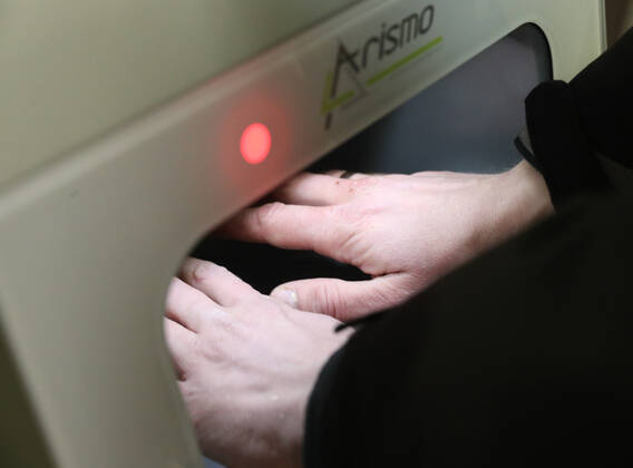 MOSCOW, RUSSIA - APRIL 27, 2020: A commuter uses a contactless hand sanitiser machine at the entrance to a station of the Moscow Underground (metro), during the pandemic of the novel coronavirus disease (COVID-19). Since 30 March, Moscow has been on lockdown. On 13 April 2020, the Moscow government introduced a digital permit system aimed at further restricting movement. Under the scheme, which became mandatory on 15 April, people need to apply for permits to travel on a vehicle or public transport around the city. As of 27 April 2020, Russia has reported more than 87,300 confirmed cases of the novel coronavirus infection, with more than 45,300 confirmed cases in Moscow. Vladimir Gerdo TASS  TS0D7345
