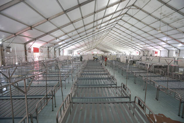 April 27, 2020, Dhaka, Bangladesh: Bangladeshi workers prepare a makeshift hospital for the treatment of Covid-19 patients at the Bashundhara Convention Centre during the nationwide lockdown to curb the spread of coronavirus (COVID-19) in Dhaka, Bangladesh, April 27, 2020. The largest makeshift hospital in the country for treating coronavirus infected patients at the International Convention City Bashundhara (ICCB) in the capital is getting ready to be inaugurated shortly. The hospital works are almost completed to be opened anytime by the government authorities concerned. Dhaka Bangladesh - ZUMAd117 20200427_zap_d117_001 Copyright: xSuvraxKantixDasx