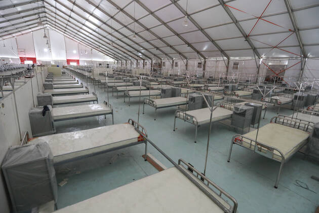 April 27, 2020, Dhaka, Bangladesh: Bangladeshi workers prepare a makeshift hospital for the treatment of Covid-19 patients at the Bashundhara Convention Centre during the nationwide lockdown to curb the spread of coronavirus (COVID-19) in Dhaka, Bangladesh, April 27, 2020. The largest makeshift hospital in the country for treating coronavirus infected patients at the International Convention City Bashundhara (ICCB) in the capital is getting ready to be inaugurated shortly. The hospital works are almost completed to be opened anytime by the government authorities concerned. Dhaka Bangladesh - ZUMAd117 20200427_zap_d117_007 Copyright: xSuvraxKantixDasx