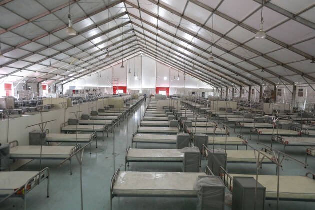 April 27, 2020, Dhaka, Bangladesh: Bangladeshi workers prepare a makeshift hospital for the treatment of Covid-19 patients at the Bashundhara Convention Centre during the nationwide lockdown to curb the spread of coronavirus (COVID-19) in Dhaka, Bangladesh, April 27, 2020. The largest makeshift hospital in the country for treating coronavirus infected patients at the International Convention City Bashundhara (ICCB) in the capital is getting ready to be inaugurated shortly. The hospital works are almost completed to be opened anytime by the government authorities concerned. Dhaka Bangladesh - ZUMAd117 20200427_zap_d117_008 Copyright: xSuvraxKantixDasx