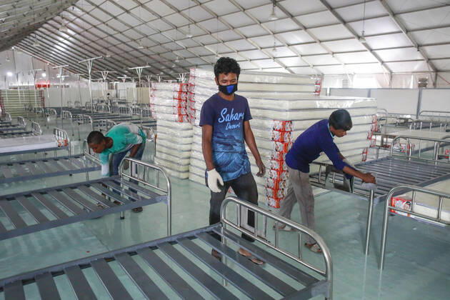 April 27, 2020, Dhaka, Bangladesh: Bangladeshi workers prepare a makeshift hospital for the treatment of Covid-19 patients at the Bashundhara Convention Centre during the nationwide lockdown to curb the spread of coronavirus (COVID-19) in Dhaka, Bangladesh, April 27, 2020. The largest makeshift hospital in the country for treating coronavirus infected patients at the International Convention City Bashundhara (ICCB) in the capital is getting ready to be inaugurated shortly. The hospital works are almost completed to be opened anytime by the government authorities concerned. Dhaka Bangladesh - ZUMAd117 20200427_zap_d117_017 Copyright: xSuvraxKantixDasx