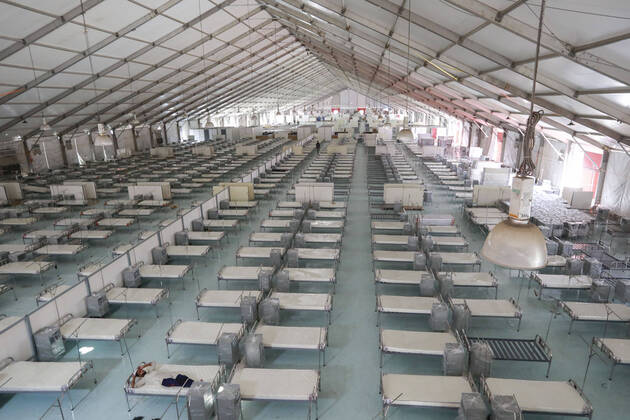 April 27, 2020, Dhaka, Bangladesh: A worker takes rest during the break inside of a makeshift hospital for the treatment of Covid-19 patients at the Bashundhara Convention Centre during the nationwide lockdown to curb the spread of coronavirus (COVID-19) in Dhaka, Bangladesh, April 27, 2020. The largest makeshift hospital in the country for treating coronavirus infected patients at the International Convention City Bashundhara (ICCB) in the capital is getting ready to be inaugurated shortly. The hospital works are almost completed to be opened anytime by the government authorities concerned. Dhaka Bangladesh - ZUMAd117 20200427_zap_d117_018 Copyright: xSuvraxKantixDasx