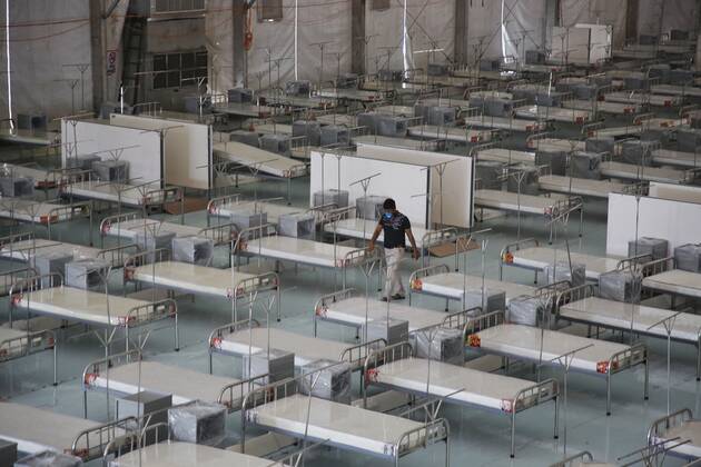 April 27, 2020, Dhaka, Bangladesh: A Bangladeshi worker prepares a makeshift hospital for the treatment of Coronavirus patients at the Bashundhara Convention Centre during a government-imposed lockdown to curb the spread Coronavirus (COVID-19)..Bangladesh has confirmed 5913 cases, with 152 deaths due to coronavirus (COVID-19) according to the IEDCR officials. Dhaka Bangladesh - ZUMAs197 20200427_zaa_s197_011 Copyright: xSultanxMahmudxMukutx