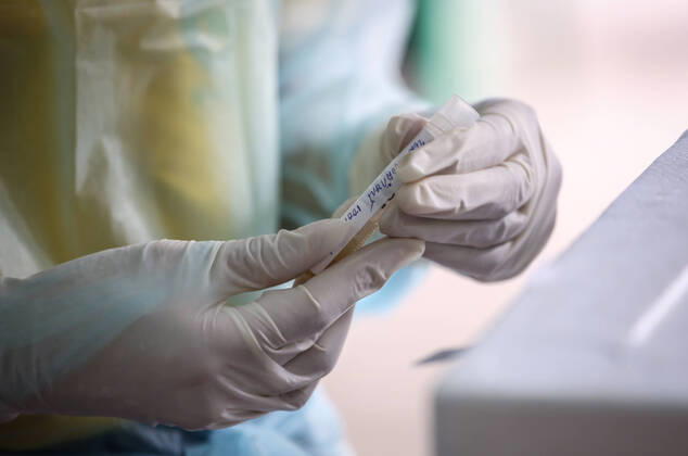 April 27, 2020, Bangkok, Thailand: A health worker wearing gloves as a precaution is seen injecting alcohol which cleans the secretions of patients suspected to be infected with the covid-19 Coronavirus during lab examination..Coronavirus disease (COVID-19) is an infectious disease caused by a newly discovered coronavirus. the virus that causes COVID-19 is mainly transmitted through droplets generated when an infected person coughs, sneezes, or exhales, these droplets are too heavy to hang in the air, and quickly fall on floors or surfaces. Bangkok Thailand - ZUMAs197 20200427_zaa_s197_015 Copyright: xPrawetxPuengsawangpholx